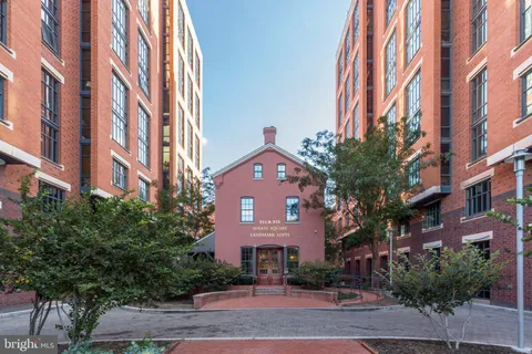 a front view of a building with street view