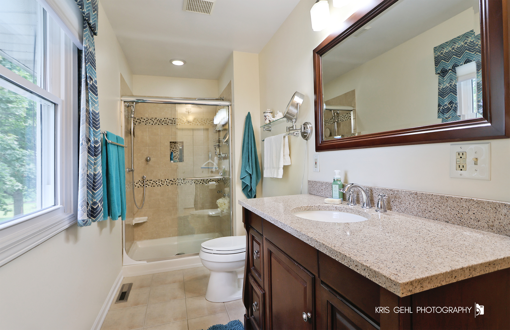 526 Whispering Pines Road Lindenhurst, IL 60046 - Photo 14 of 38 a bathroom with a granite countertop sink a toilet a mirror and shower