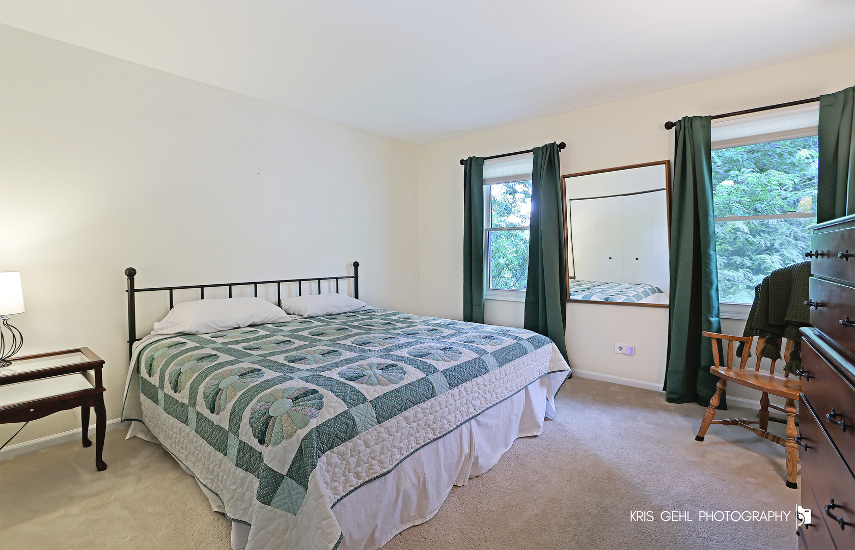 526 Whispering Pines Road Lindenhurst, IL 60046 - Photo 15 of 38 a bedroom with a large bed and a window