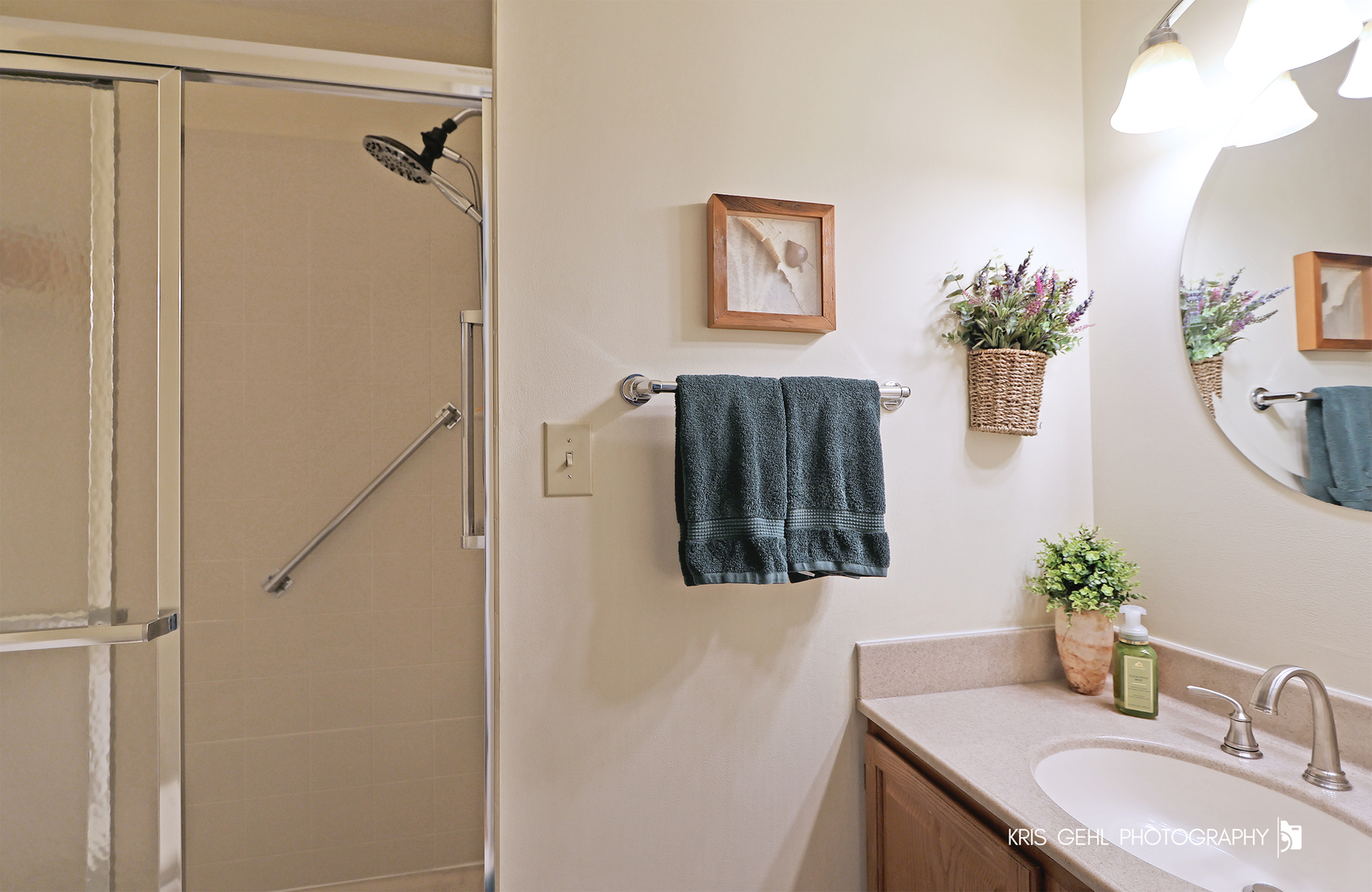 526 Whispering Pines Road Lindenhurst, IL 60046 - Photo 22 of 38 a bathroom with a sink and mirror