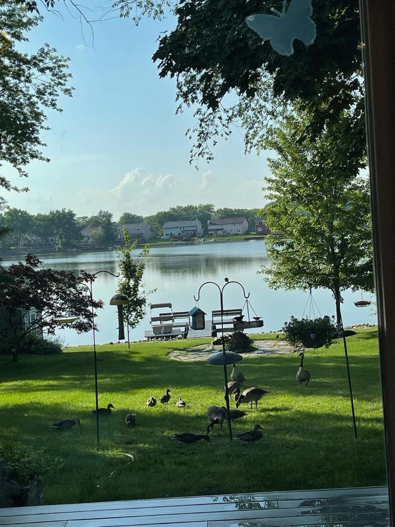 526 Whispering Pines Road Lindenhurst, IL 60046 - Photo 38 of 38 a view of a lake with outdoor space