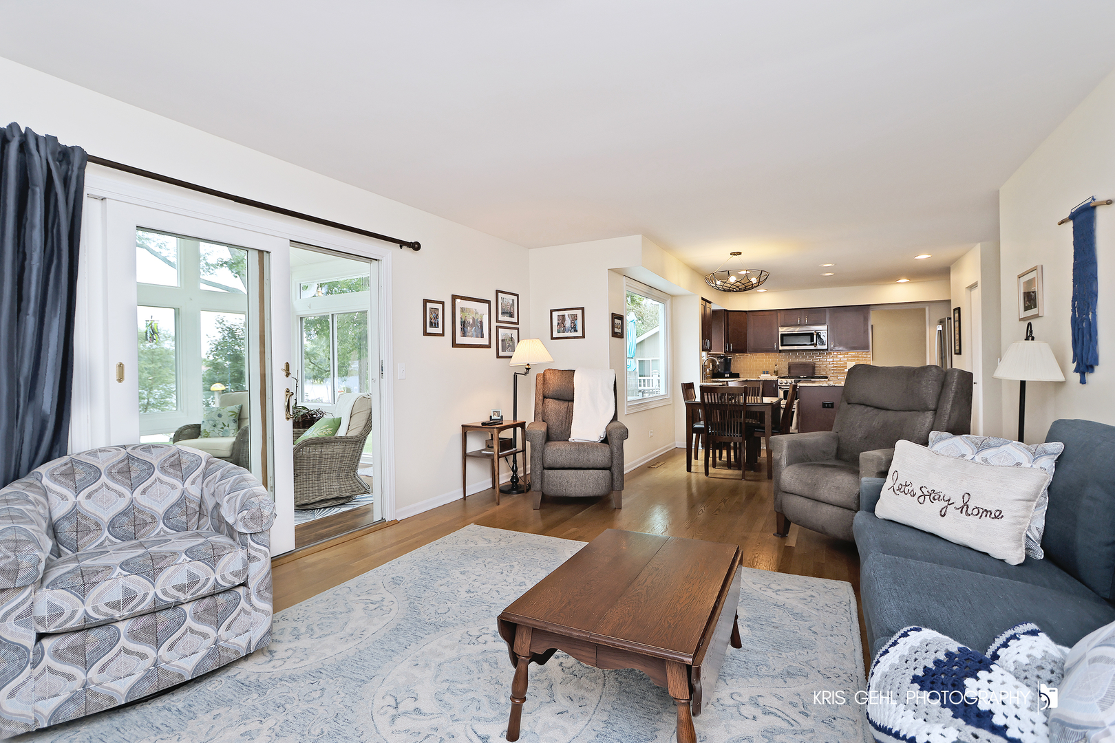 526 Whispering Pines Road Lindenhurst, IL 60046 - Photo 9 of 38 a living room with furniture and a large window
