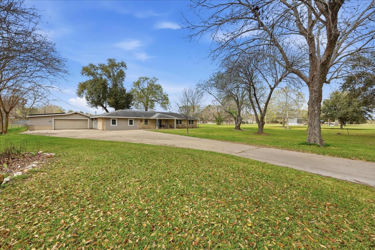134 Meneley Road Winnie, TX 77665 - Photo 11 of 42 a view of a park with large trees