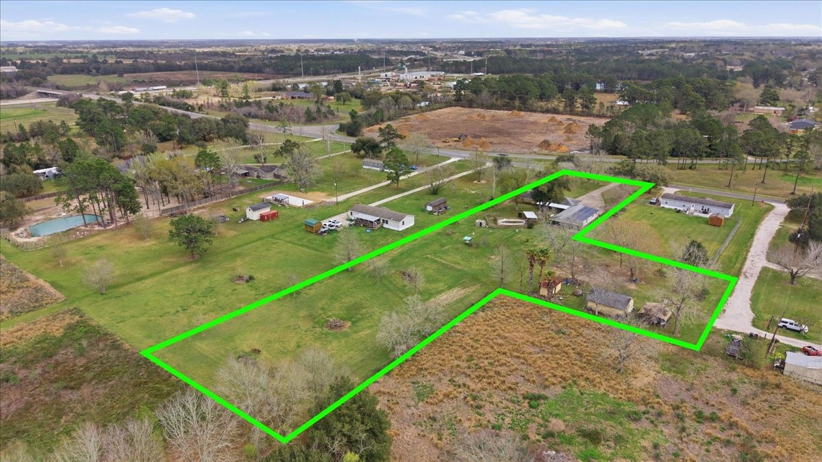 134 Meneley Road Winnie, TX 77665 - Photo 2 of 42 an aerial view of a yard