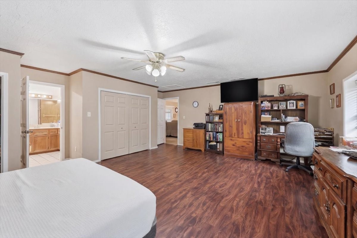 134 Meneley Road Winnie, TX 77665 - Photo 28 of 42 a bedroom with furniture and a window