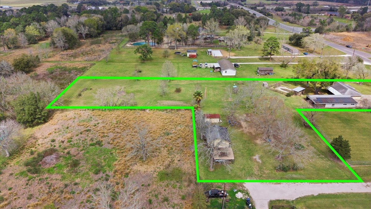 134 Meneley Road Winnie, TX 77665 - Photo 5 of 42 an aerial view of a houses with outdoor space