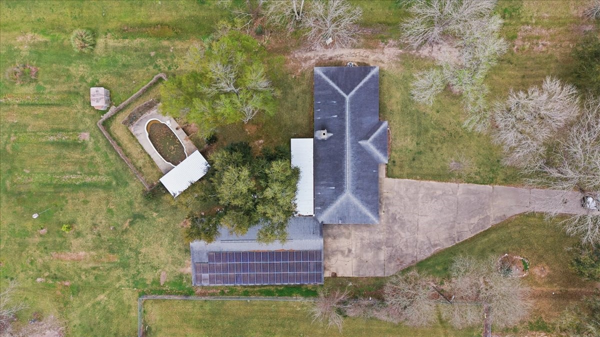 134 Meneley Road Winnie, TX 77665 - Photo 6 of 42 an aerial view of houses with yard