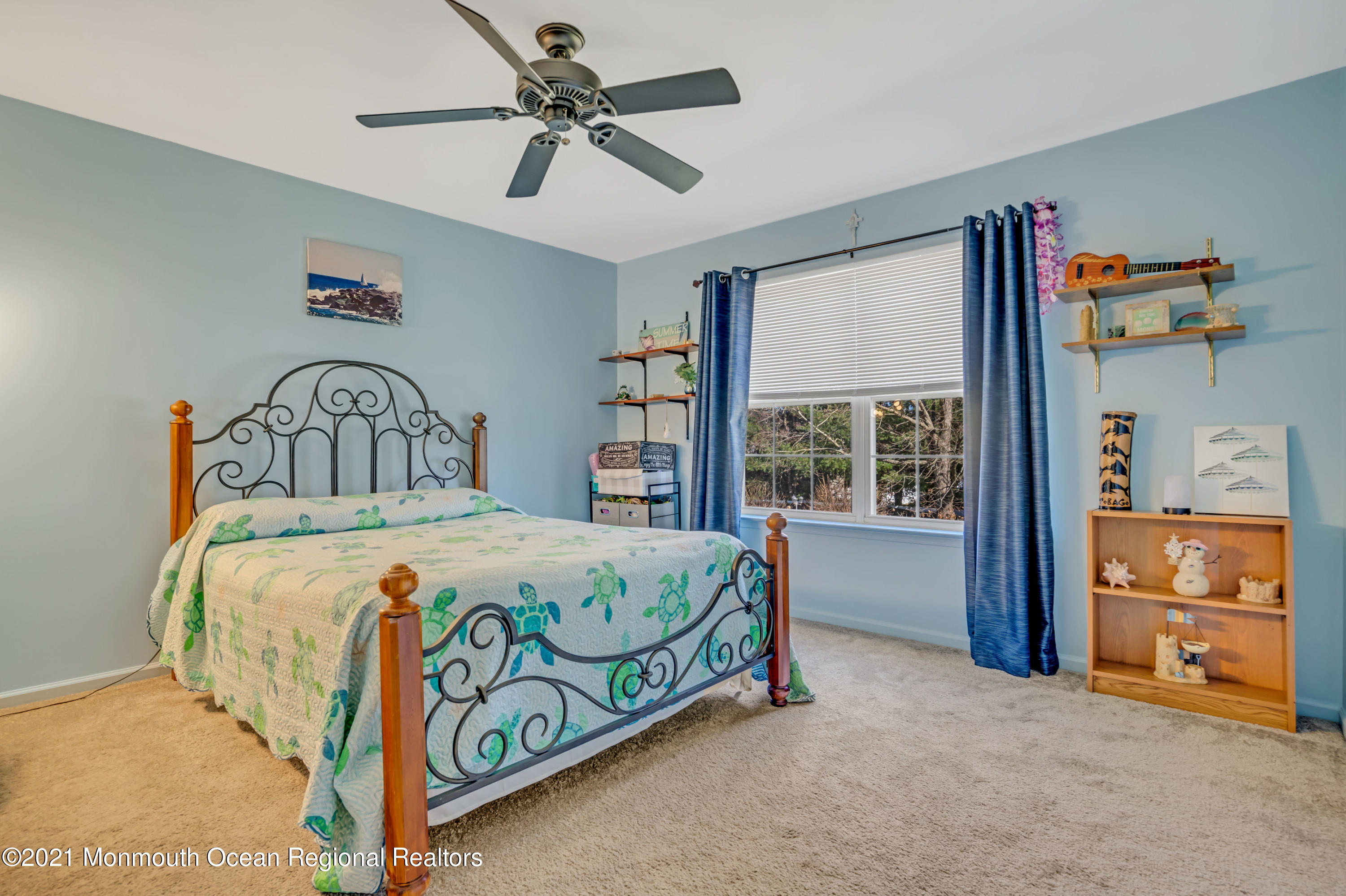 336 Meadowood Road Jackson, NJ 08527 - Photo 17 of 33 a bedroom with a bed and a large window