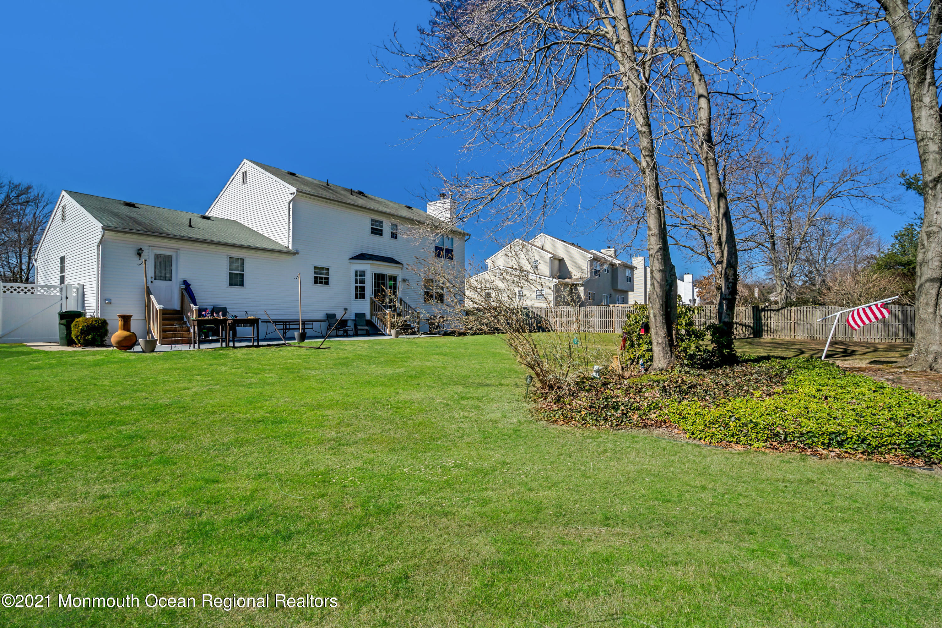 336 Meadowood Road Jackson, NJ 08527 - Photo 30 of 33 a front view of a house with garden