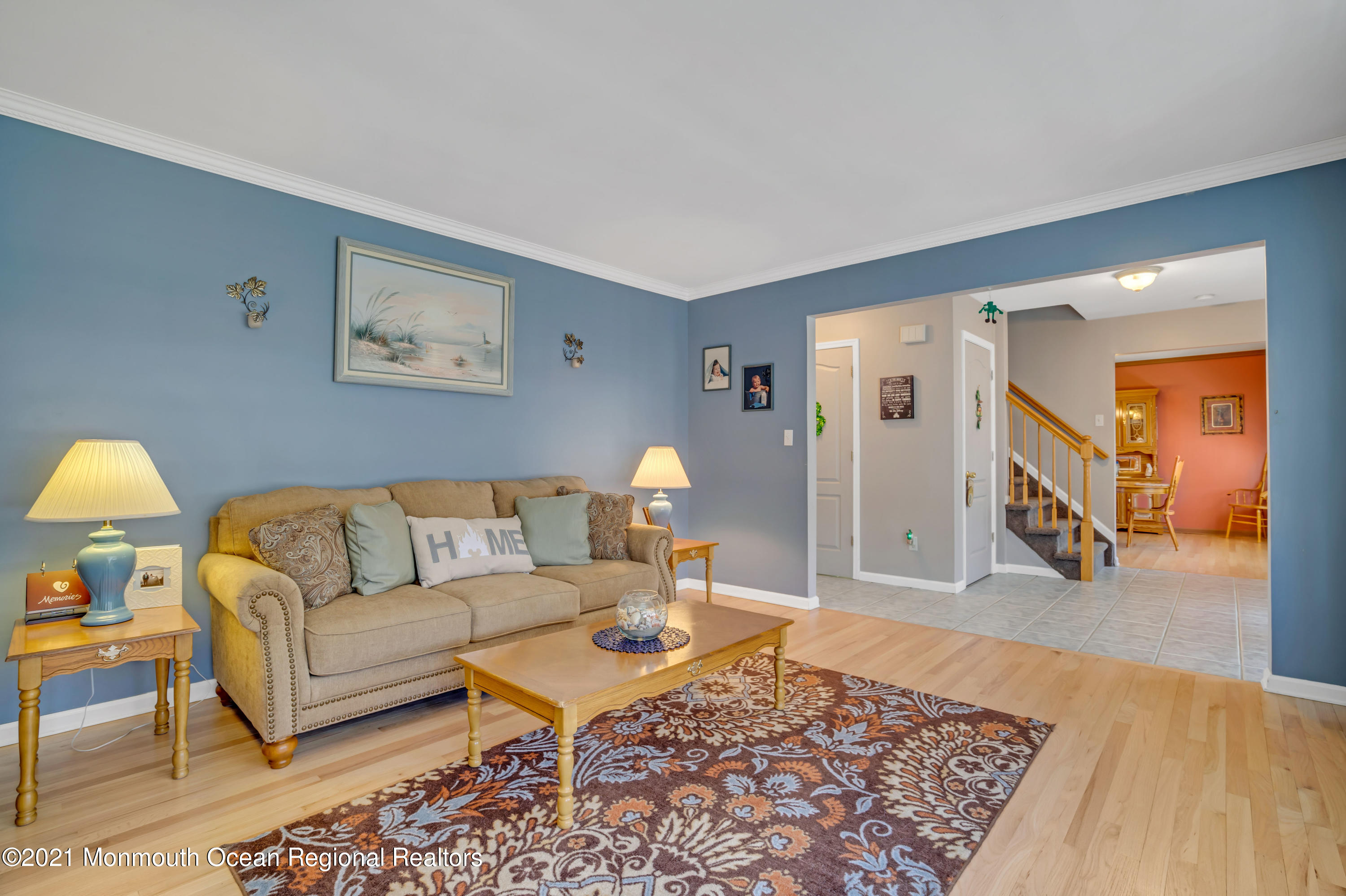 336 Meadowood Road Jackson, NJ 08527 - Photo 6 of 33 a living room with furniture and a wooden floor