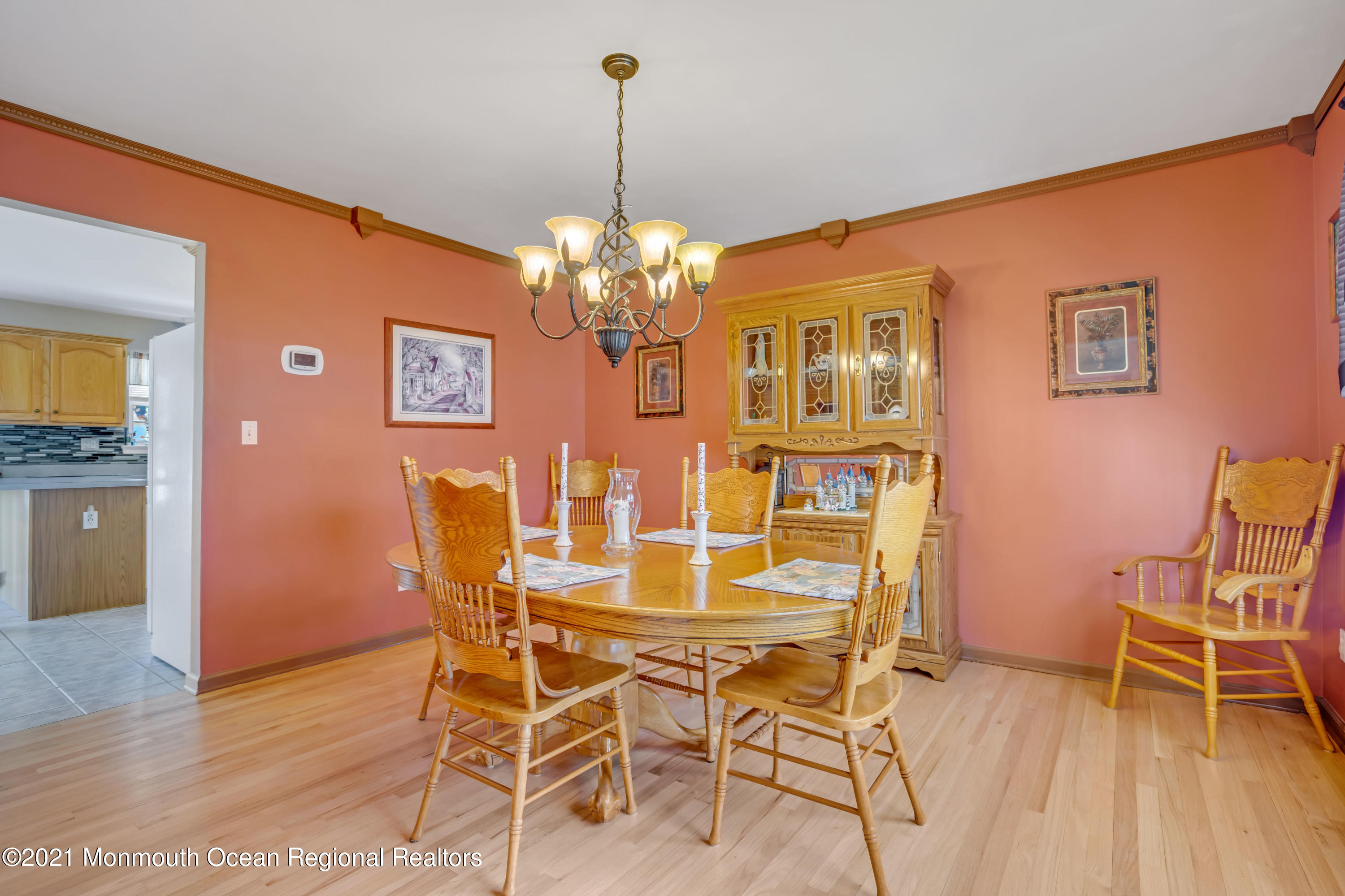 336 Meadowood Road Jackson, NJ 08527 - Photo 7 of 33 a dining room with furniture and chandelier