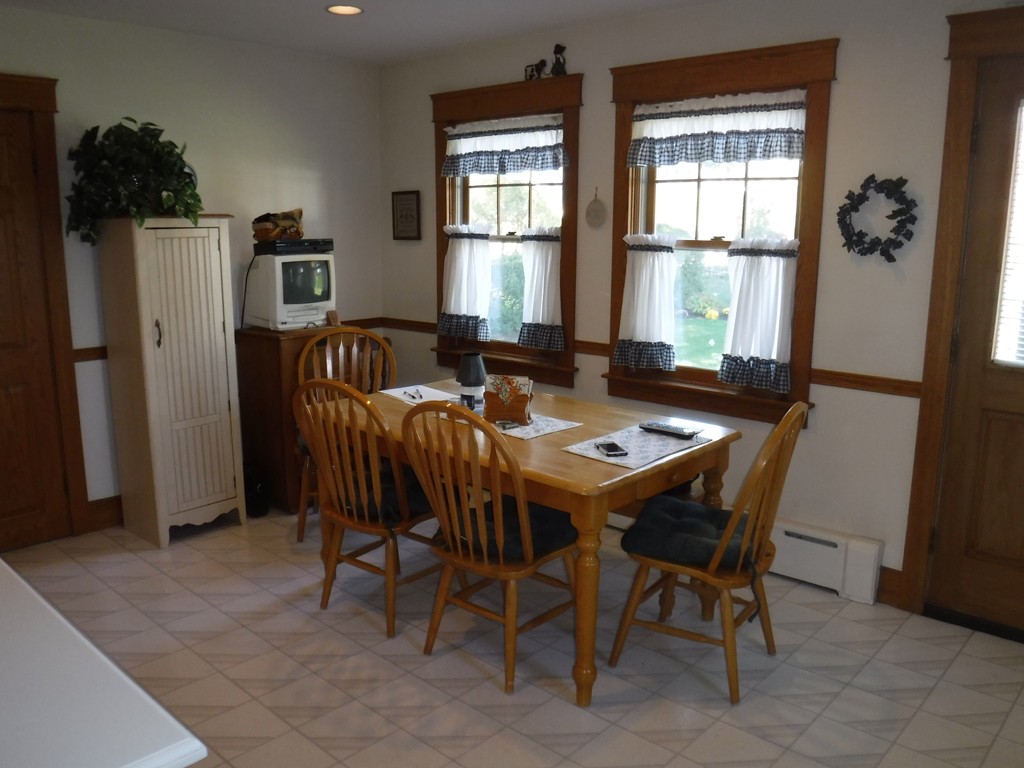85 St Nicholas Avenue Worcester, MA 01606 - Photo 11 of 28 a view of a dining room with furniture and window