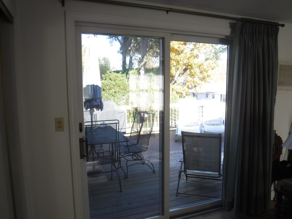 85 St Nicholas Avenue Worcester, MA 01606 - Photo 15 of 28 a room with wooden floor and a porch