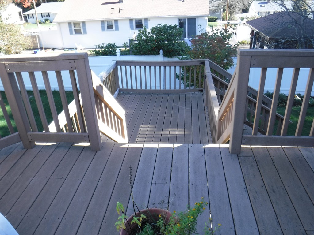 85 St Nicholas Avenue Worcester, MA 01606 - Photo 20 of 28 a balcony with wooden floor
