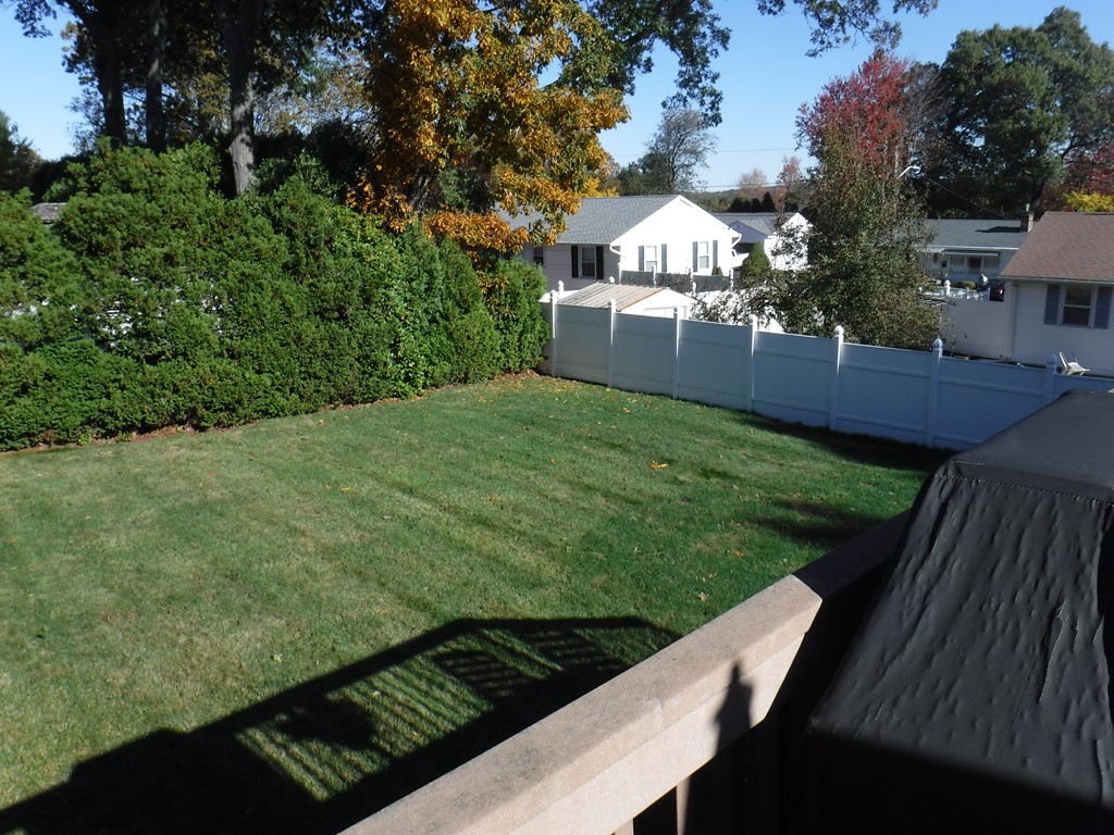 85 St Nicholas Avenue Worcester, MA 01606 - Photo 22 of 28 a view of a backyard with a garden