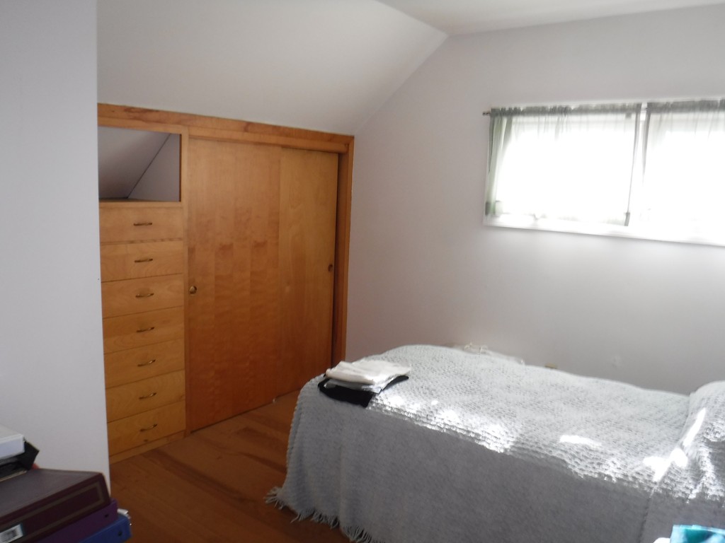 85 St Nicholas Avenue Worcester, MA 01606 - Photo 6 of 28 a bedroom with a bed and a window