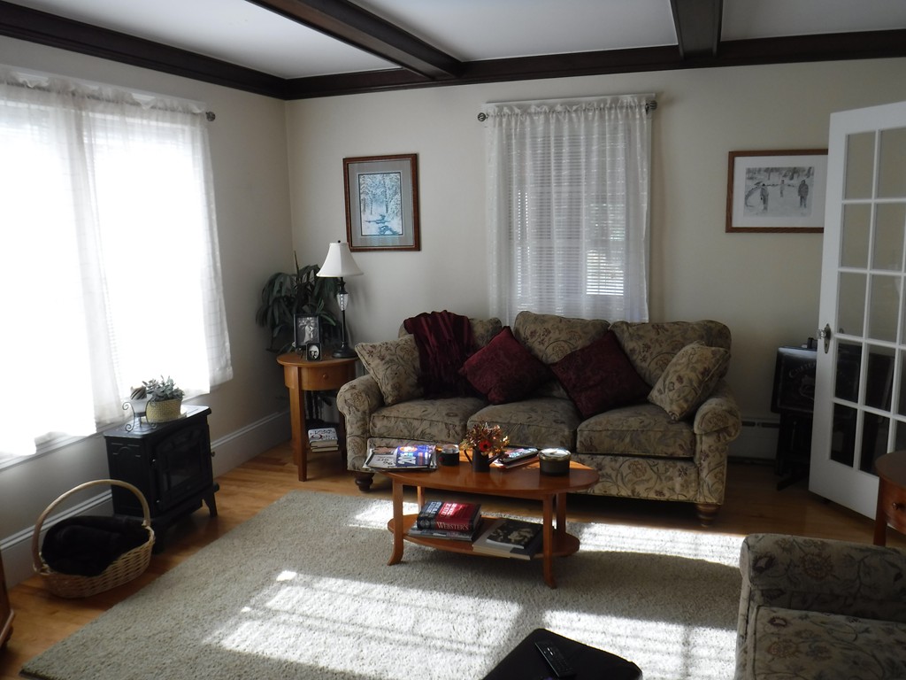 85 St Nicholas Avenue Worcester, MA 01606 - Photo 10 of 28 a living room with furniture and a window