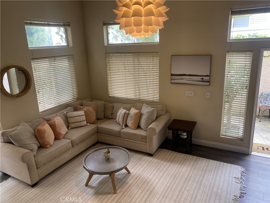 620 4th Street Hermosa Beach, CA 90254 - Photo 1 of 9 a living room with furniture and a window