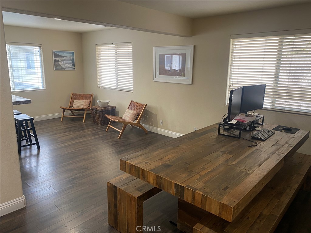 620 4th Street Hermosa Beach, CA 90254 - Photo 2 of 9 a room with wooden floor and furniture
