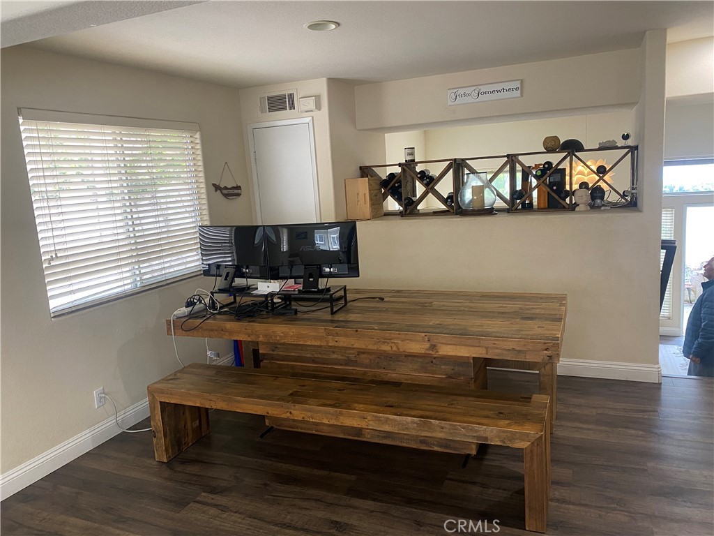 620 4th Street Hermosa Beach, CA 90254 - Photo 3 of 9 a view of a room with gym equipment and wooden floor