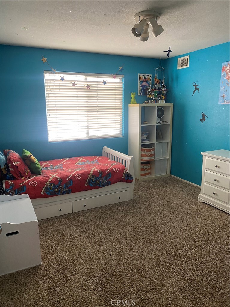 620 4th Street Hermosa Beach, CA 90254 - Photo 8 of 9 a bedroom with a bed and a window