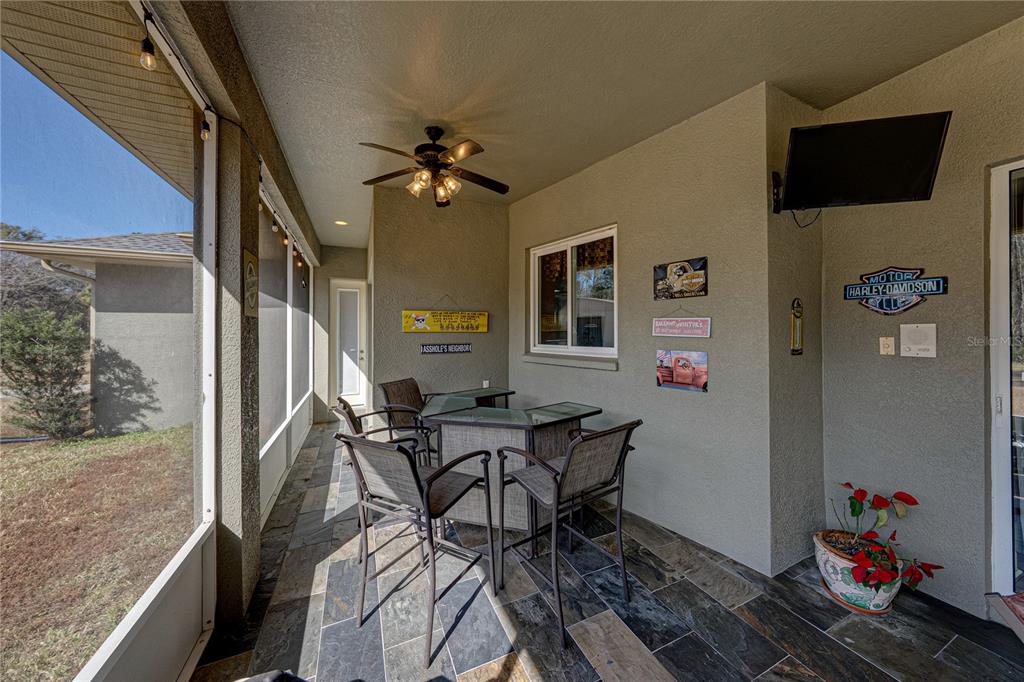27154 Raven Brook Road Wesley Chapel, FL 33544 - Photo 52 of 65 a view of a livingroom with furniture and a window