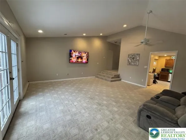 a view of livingroom with furniture and windows