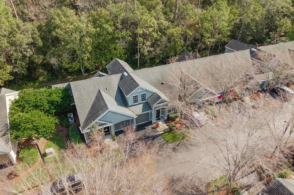 3521 Kings Road, Unit 102 Palm Harbor, FL 34685 - Photo 30 of 50 a view of a house with a yard and sitting area