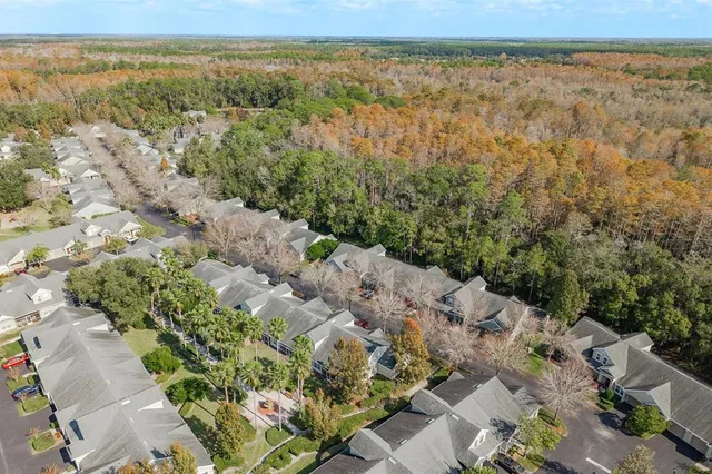 an aerial view of residential building and green space