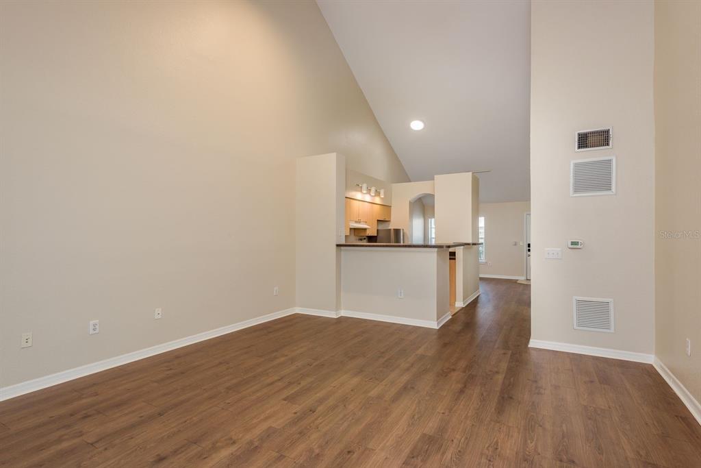 3521 Kings Road, Unit 102 Palm Harbor, FL 34685 - Photo 8 of 50 a view of a kitchen with wooden floor