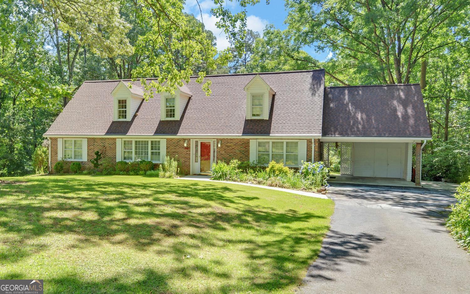 400 Harris Street Toccoa, GA 30577 - Photo 1 of 49 a front view of a house with a yard