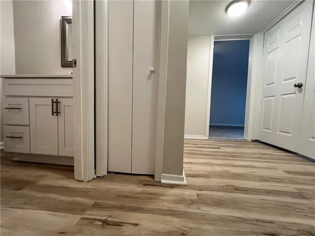 a view of a room with racks on the wall