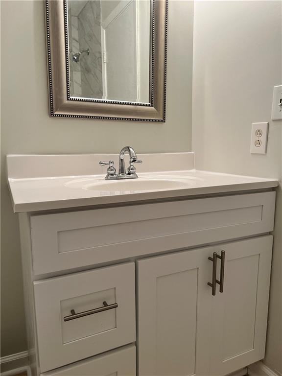 2805 Northeast Expressway Northeast, Unit B13 Atlanta, GA 30345 - Photo 23 of 69 a bathroom with a sink and a mirror