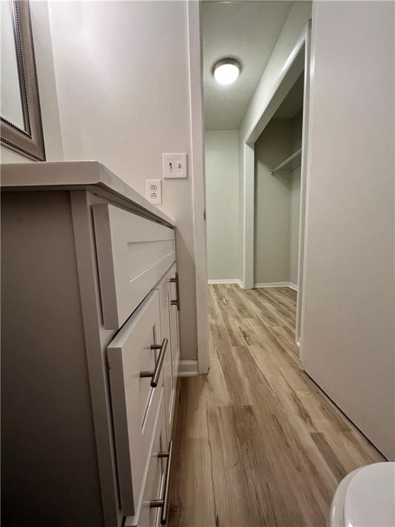 2805 Northeast Expressway Northeast, Unit B13 Atlanta, GA 30345 - Photo 25 of 69 a view of a hallway and wooden floor