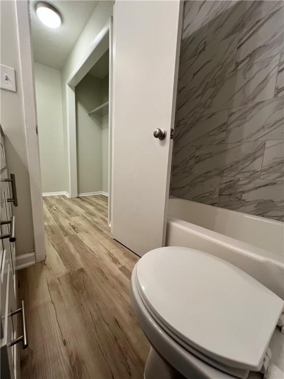 2805 Northeast Expressway Northeast, Unit B13 Atlanta, GA 30345 - Photo 27 of 69 a bathroom with a toilet and a tub