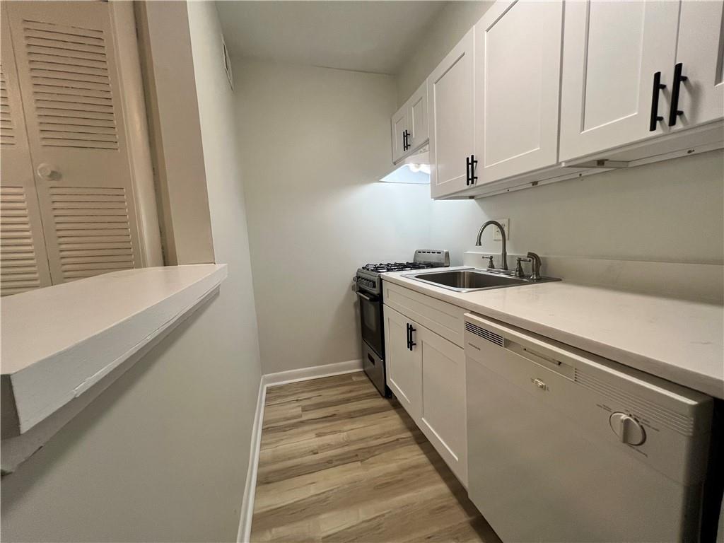 2805 Northeast Expressway Northeast, Unit B13 Atlanta, GA 30345 - Photo 44 of 69 a utility room with dryer and washer