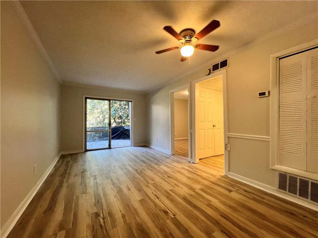 2805 Northeast Expressway Northeast, Unit B13 Atlanta, GA 30345 - Photo 5 of 69 a view of an empty room with a window