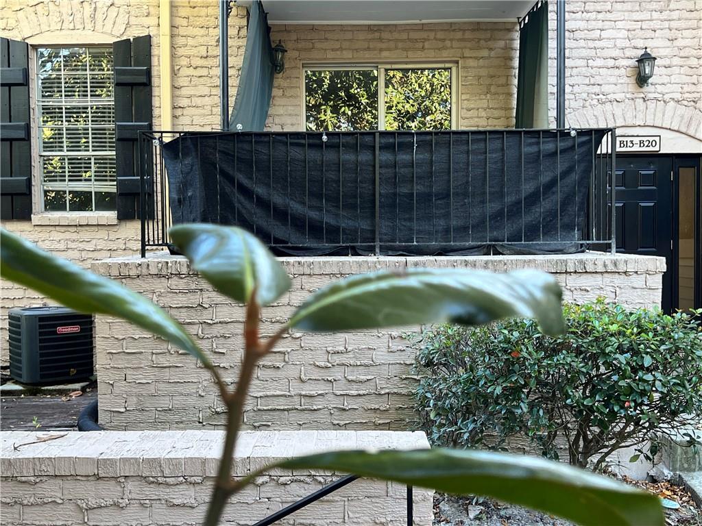2805 Northeast Expressway Northeast, Unit B13 Atlanta, GA 30345 - Photo 57 of 69 a view of a balcony with chairs