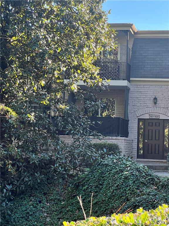 2805 Northeast Expressway Northeast, Unit B13 Atlanta, GA 30345 - Photo 59 of 69 a brick building with a yard