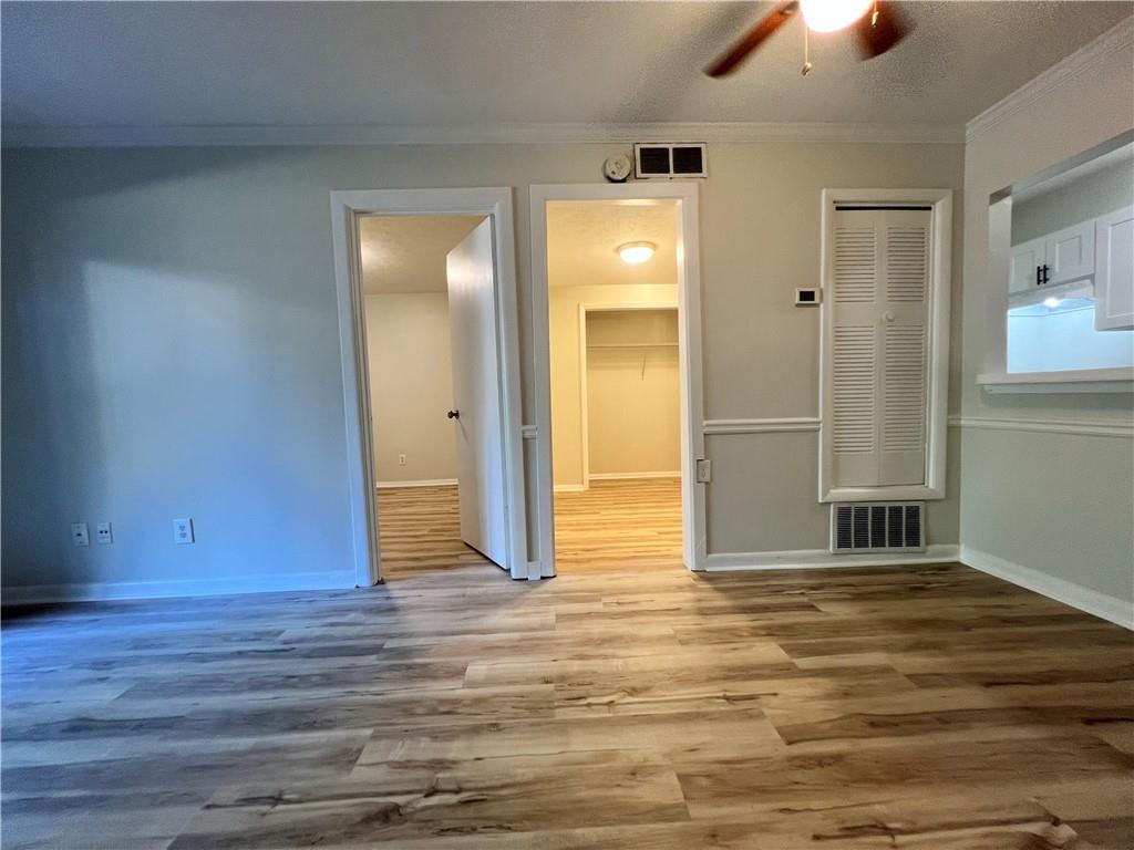 2805 Northeast Expressway Northeast, Unit B13 Atlanta, GA 30345 - Photo 7 of 69 a view of empty room with wooden floor