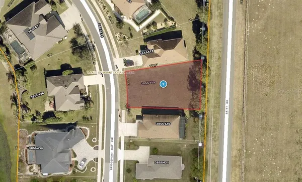 with a bathroom with a granite countertop shower and a mirror