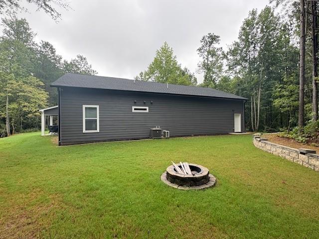 3199 Big Ridge Road Talking Rock, GA 30175 - Photo 3 of 25 a backyard of a house with table and chairs