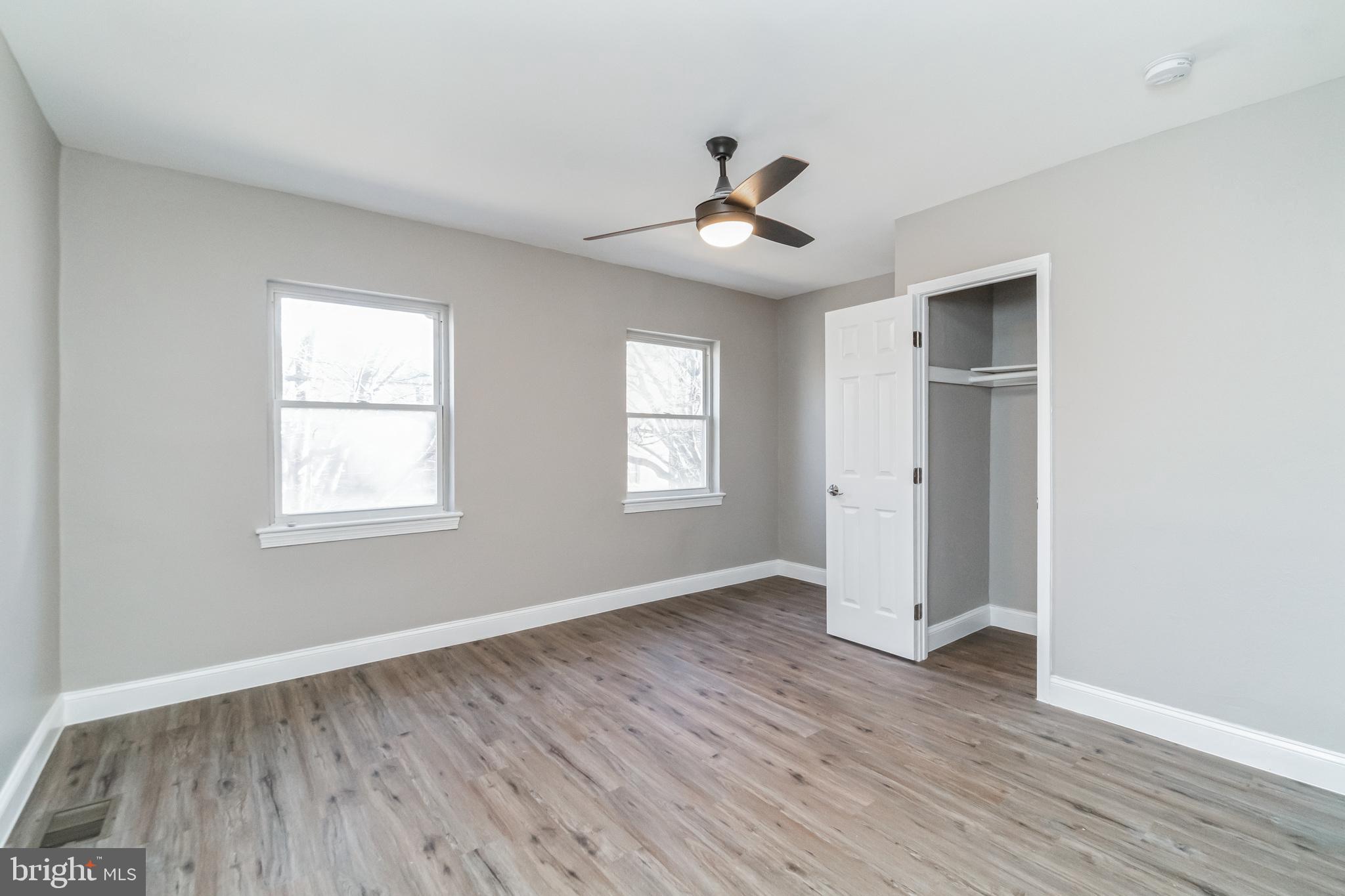 1515 First Street Southwest Washington, DC 20024 - Photo 16 of 37 a view of an empty room with wooden floor and a window