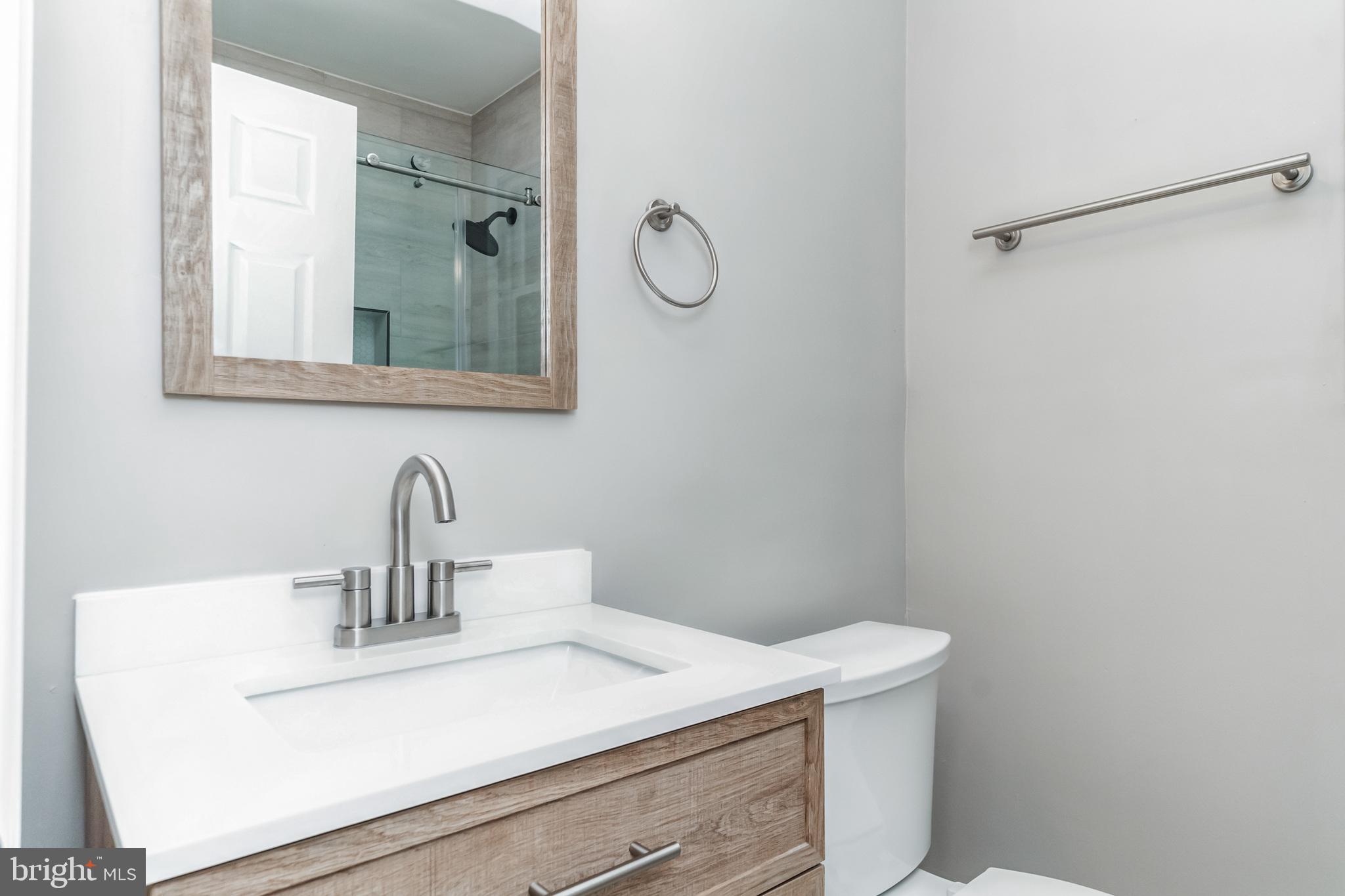 1515 First Street Southwest Washington, DC 20024 - Photo 17 of 37 a bathroom with a sink and a mirror