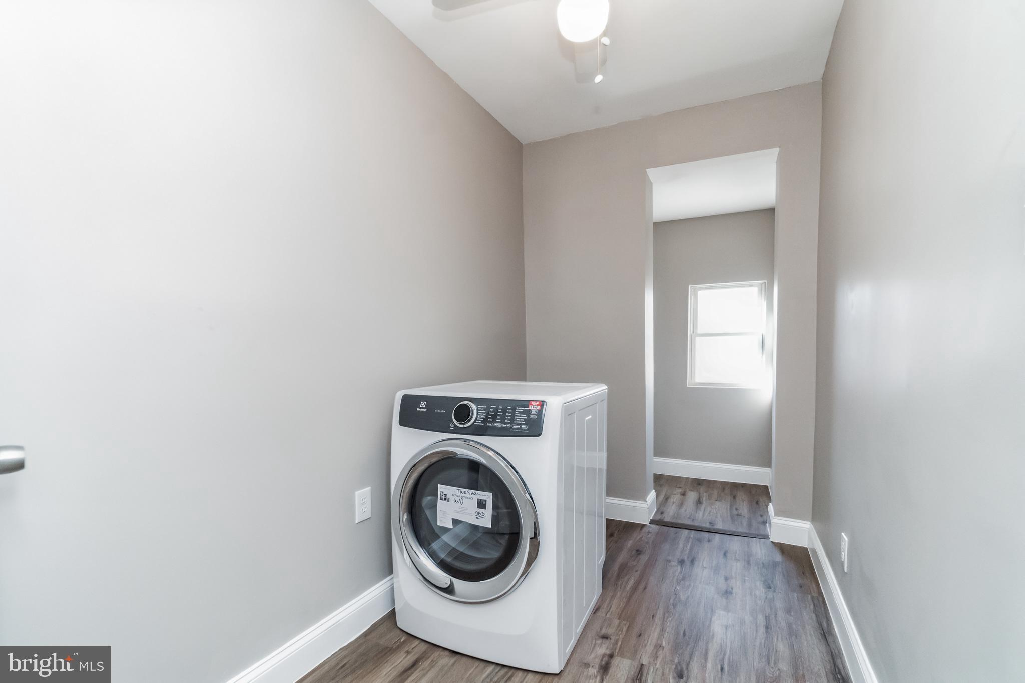 1515 First Street Southwest Washington, DC 20024 - Photo 21 of 37 a utility room with dryer and washer