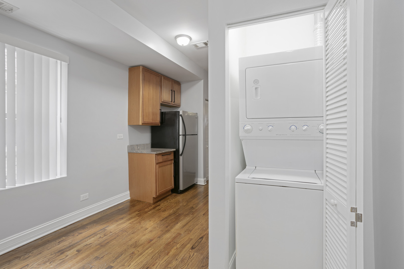 2005 West Jarvis Avenue, Unit 3 Chicago, IL 60645 - Photo 6 of 15 a room with a washer and dryer