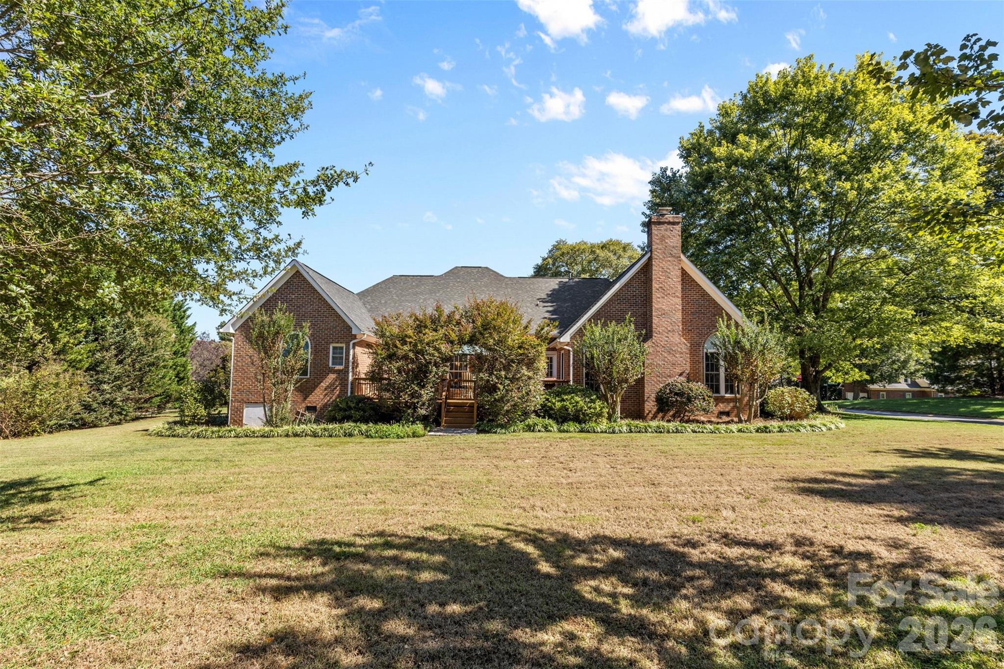 1337 Braeburn Road Northwest Concord, NC 28027 - Photo 27 of 36 a front view of a house with a yard and trees