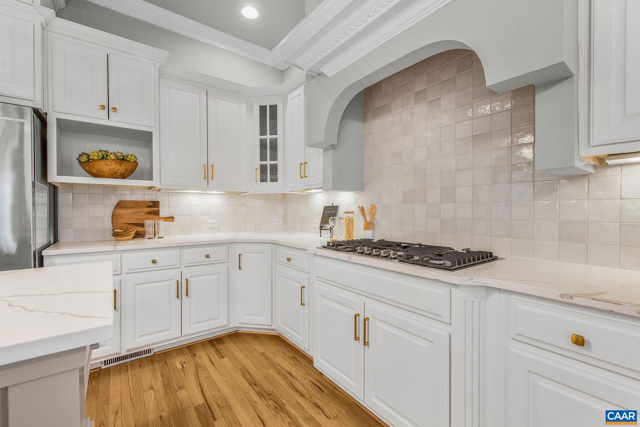 2556 Summit Ridge Trail Charlottesville, VA 22911 - Photo 36 of 75 a kitchen with stainless steel appliances granite countertop a sink and a stove