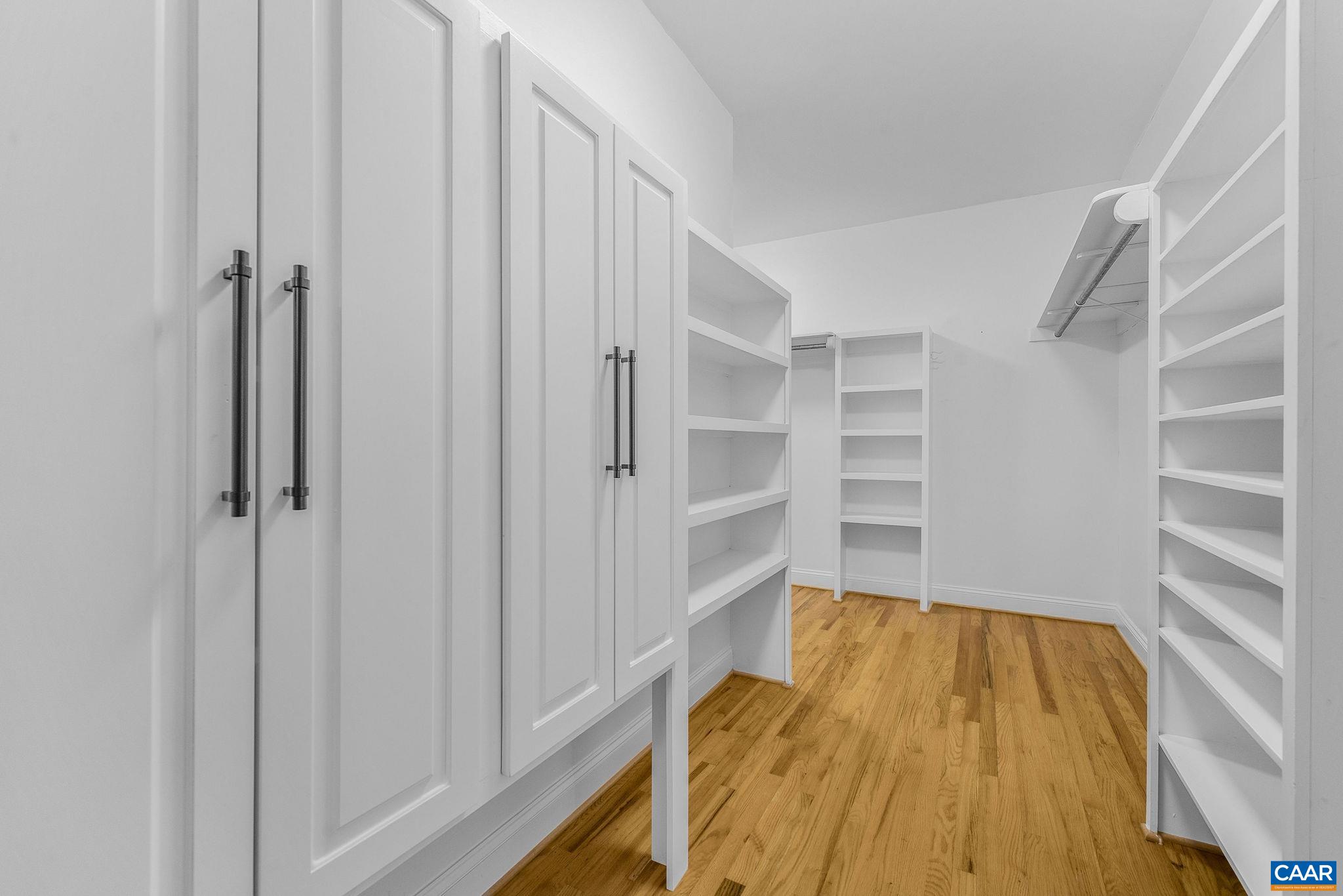 2556 Summit Ridge Trail Charlottesville, VA 22911 - Photo 57 of 75 a view of walk in closet with empty racks