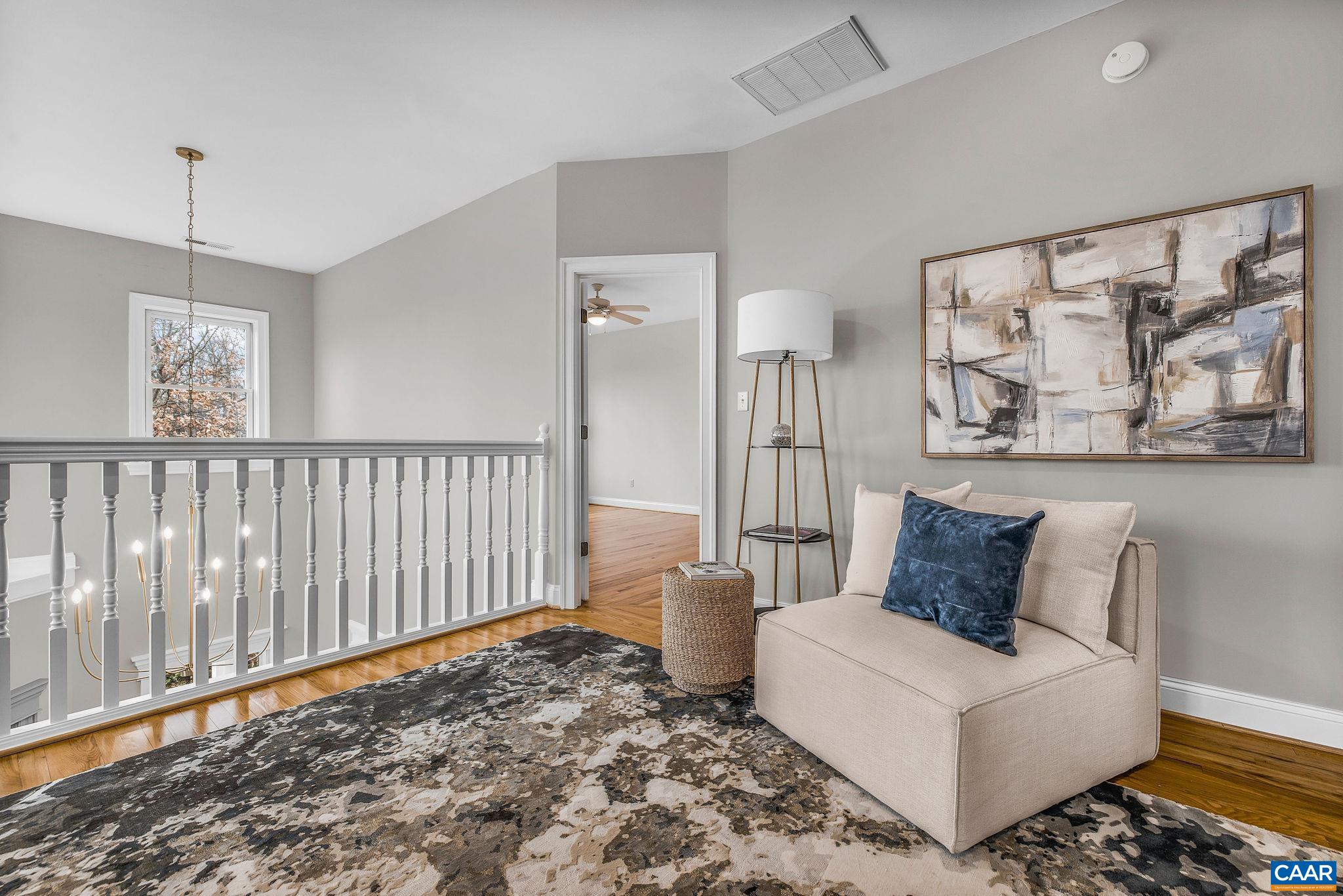 2556 Summit Ridge Trail Charlottesville, VA 22911 - Photo 62 of 75 a living room with furniture and wooden floor